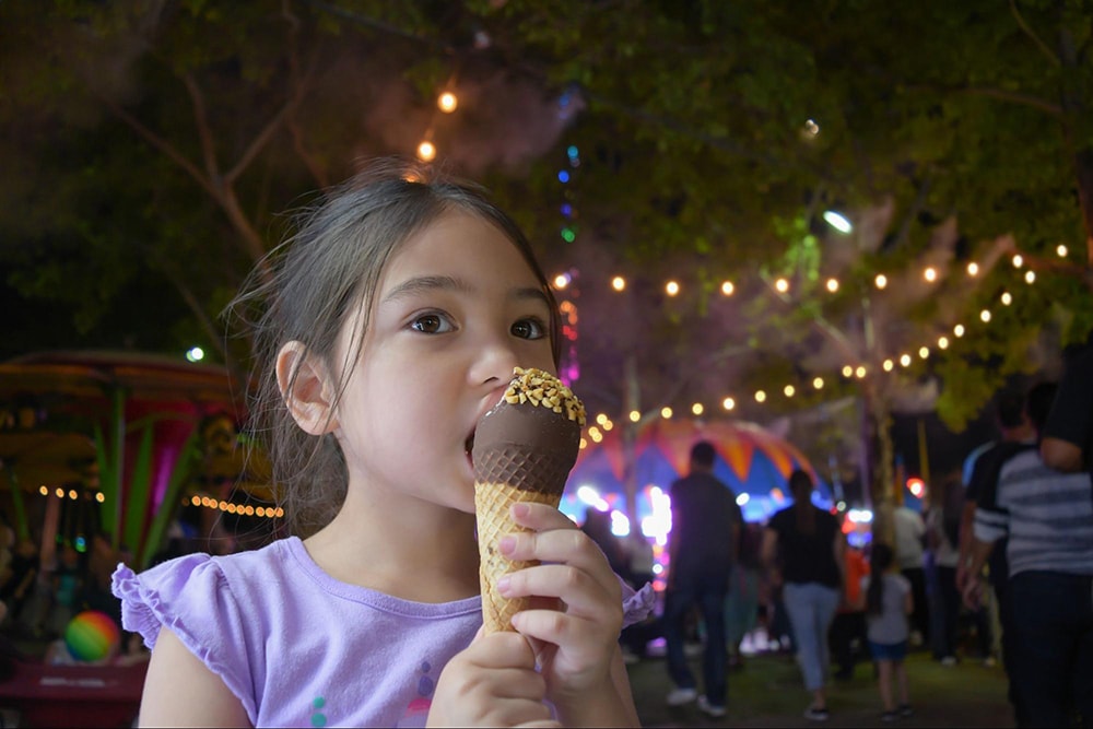 A fresh ice cream is perfect for a treat while enjoying the lake view at night 